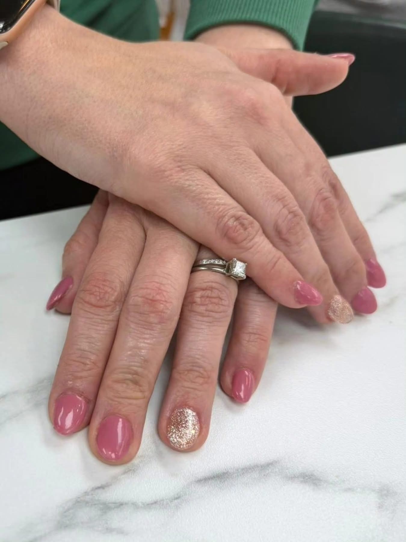 Dusty pink round nails with gold glitter accent nail at Ash's Lashes and Esthetics